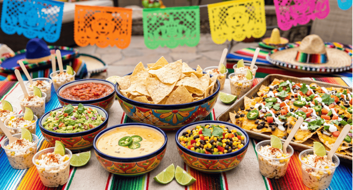 Colorful Cinco de Mayo party food and decorations for a festive celebration.