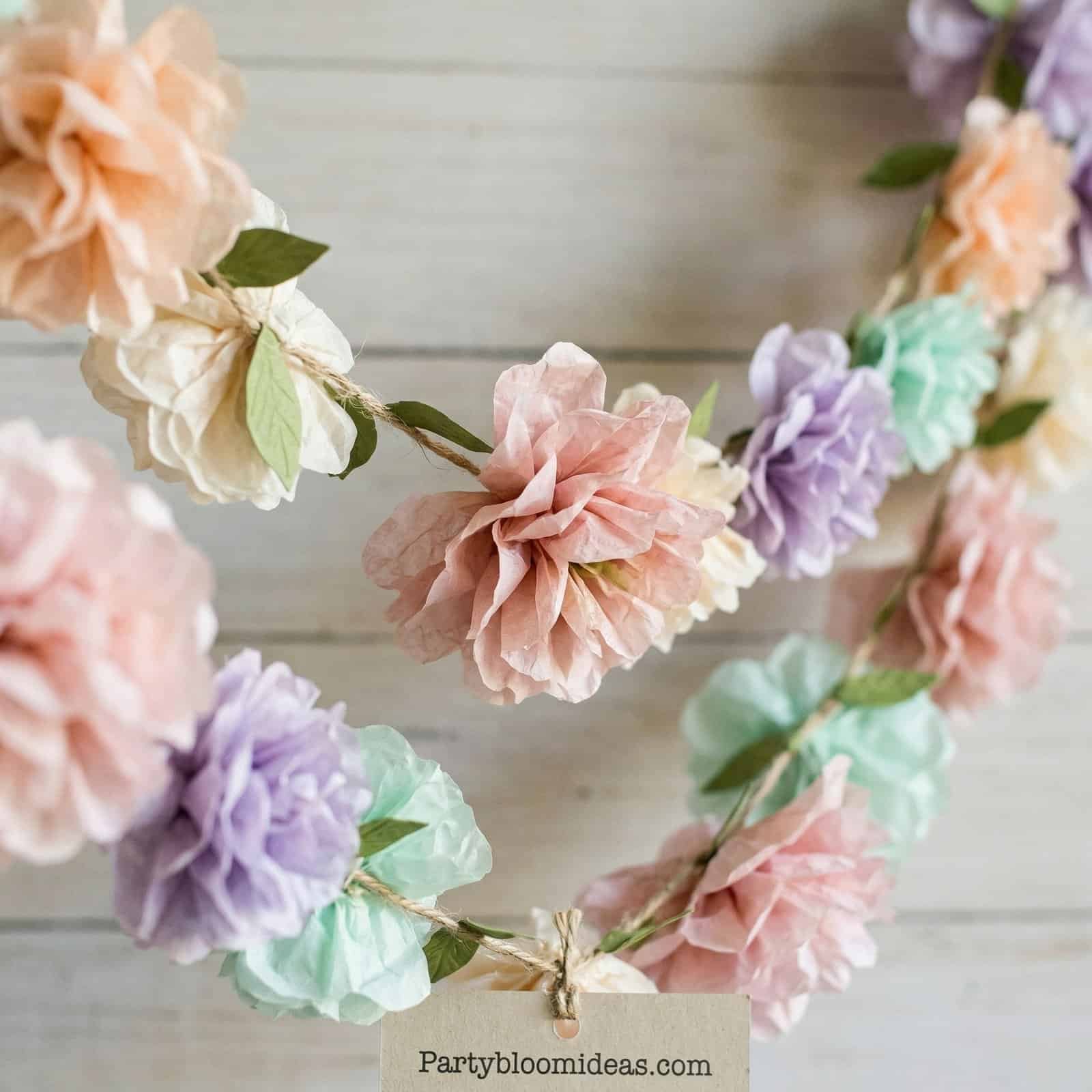 Colorful paper flower garland for Easter and spring celebrations.