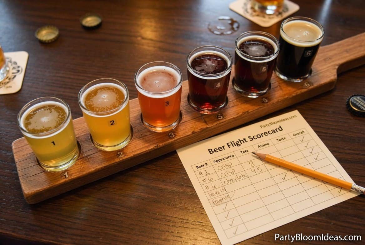 Craft beer tasting flight with multiple glasses arranged on wooden paddle for Father’s Day party