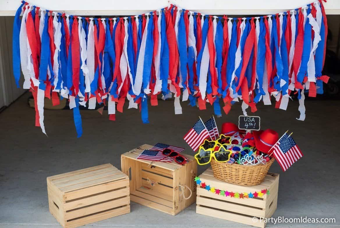 Festive 4th of July DIY decorations with ribbons, flags, and accessories for a fun celebration.
