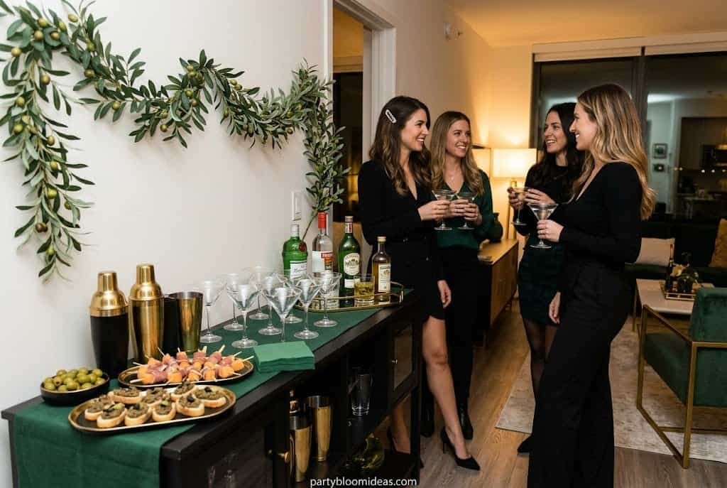 Dirty martini themed bachelorette party setup in green, black, and gold
