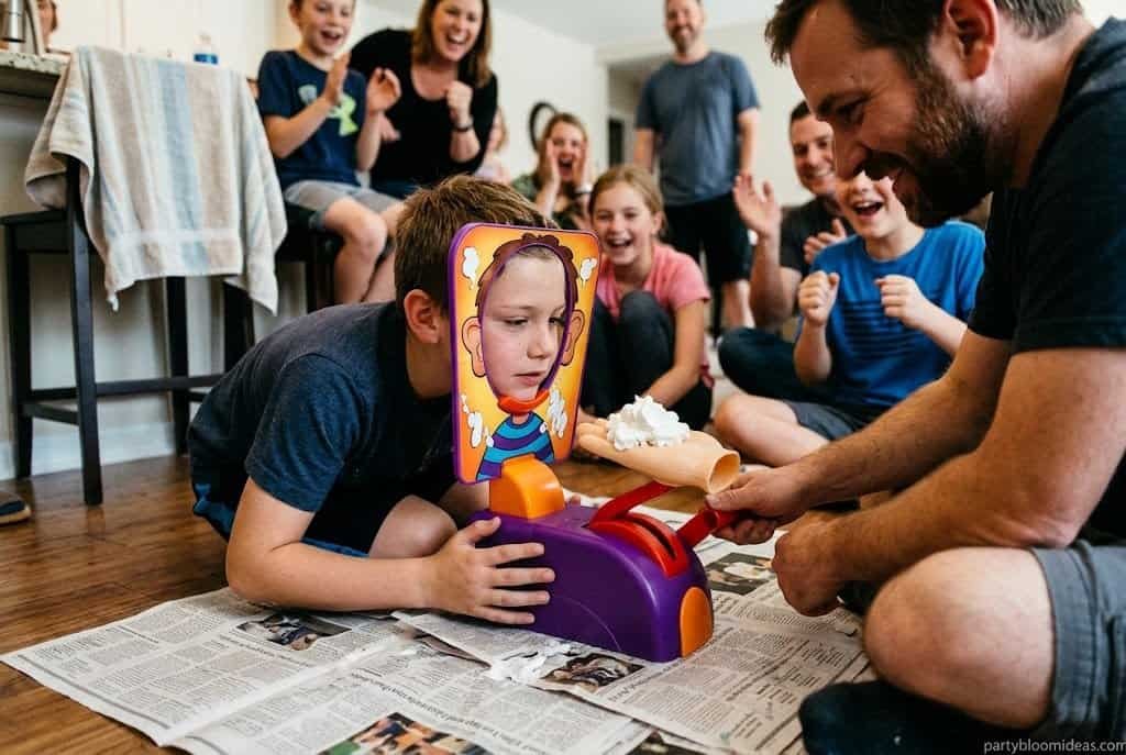 Funny whipped cream Thanksgiving challenge with competitive family members laughing together