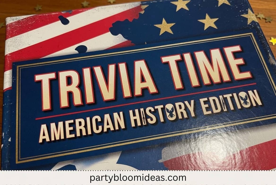 Family sitting together answering 4th of July trivia questions at an outdoor table