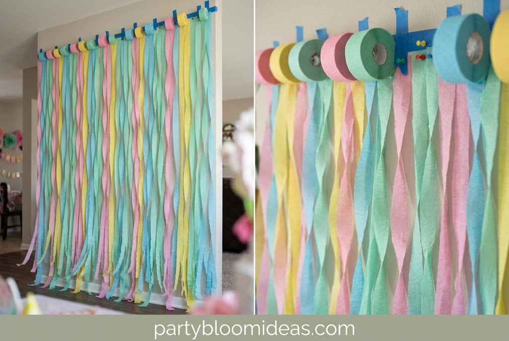 Colorful DIY paper and streamer party backdrop for birthdays and celebrations